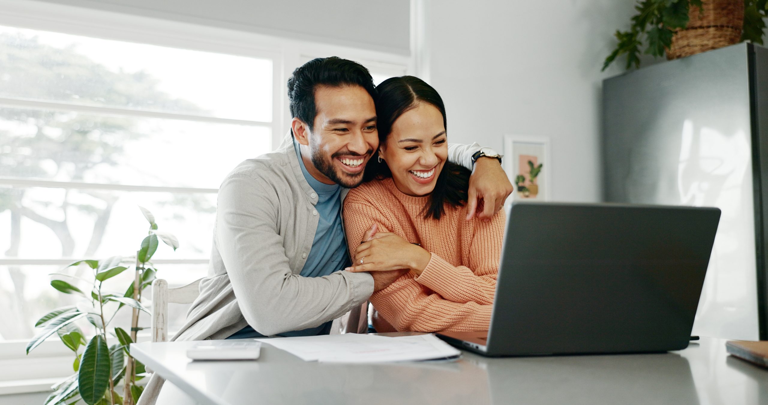 Couple working on computer